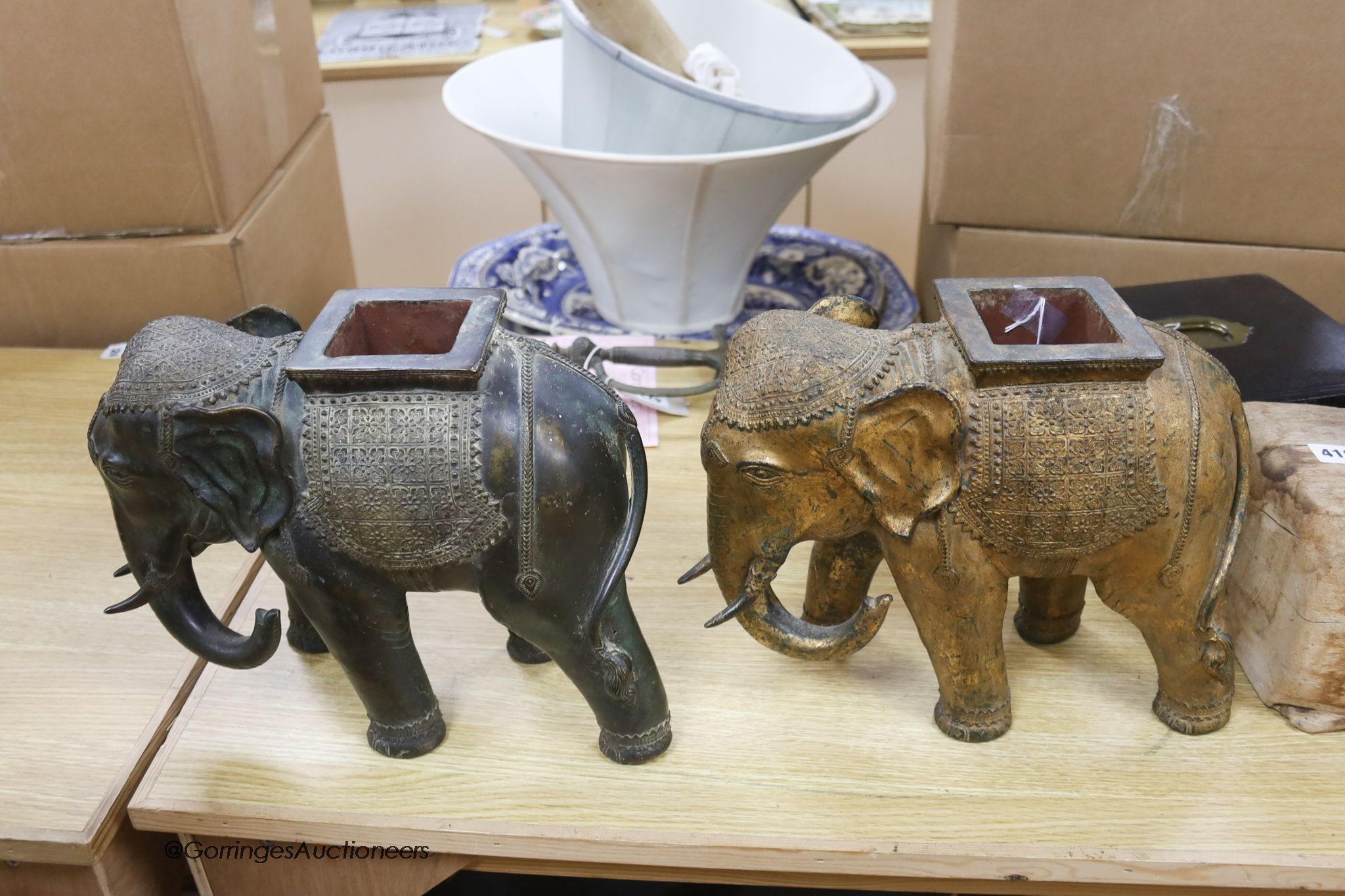 A pair of Indian bronze elephant jardinieres, height 26cm